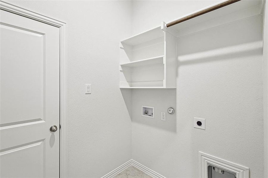 Washroom featuring gas dryer hookup, hookup for a washing machine, and electric dryer hookup