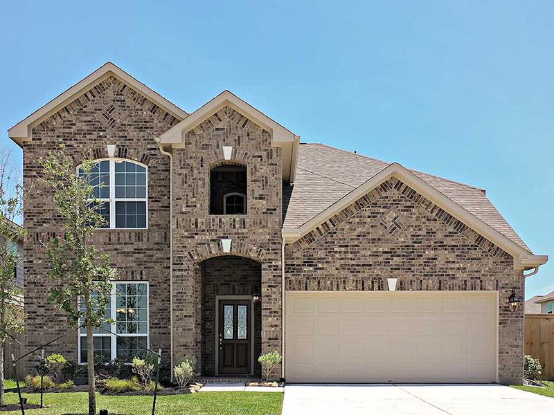 New construction Single-Family house The Winchester, 103 Water Grass Trail, Clute, TX 77531 - photo