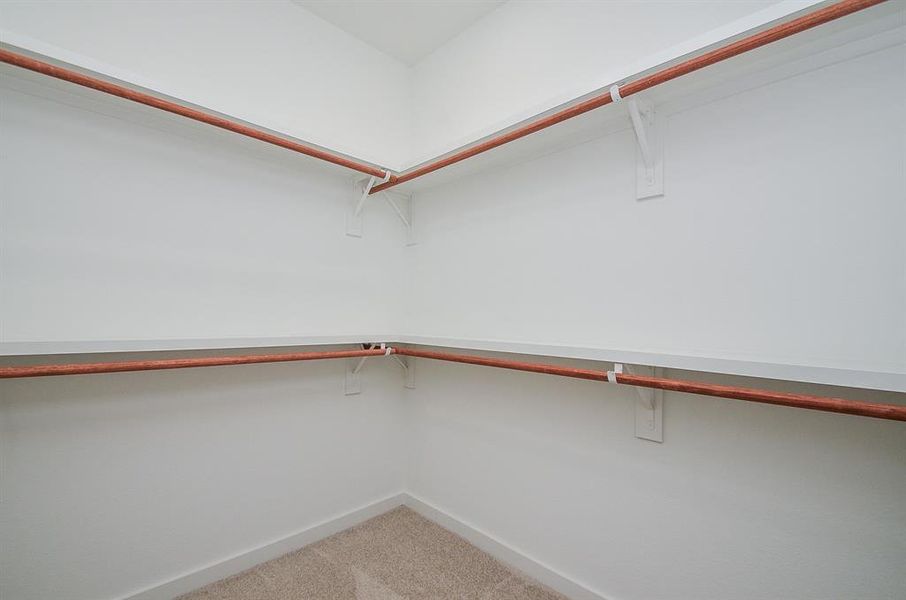 View of the ample closet space of the secondary bedroom.