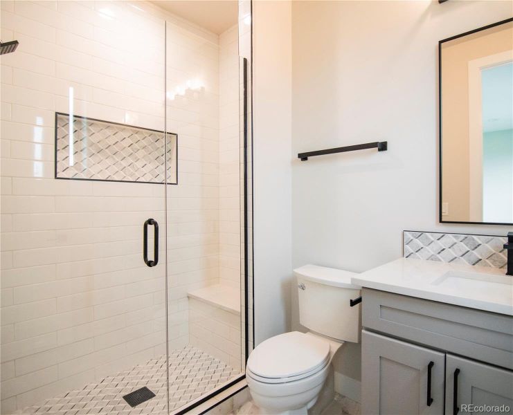 Guest Bathroom with poured shower pan