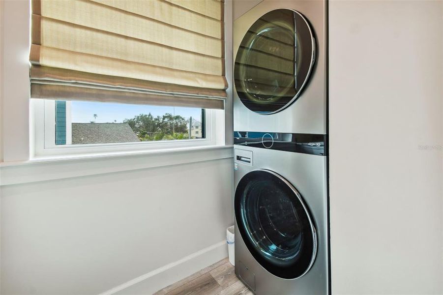 Laundry room features a large picture window