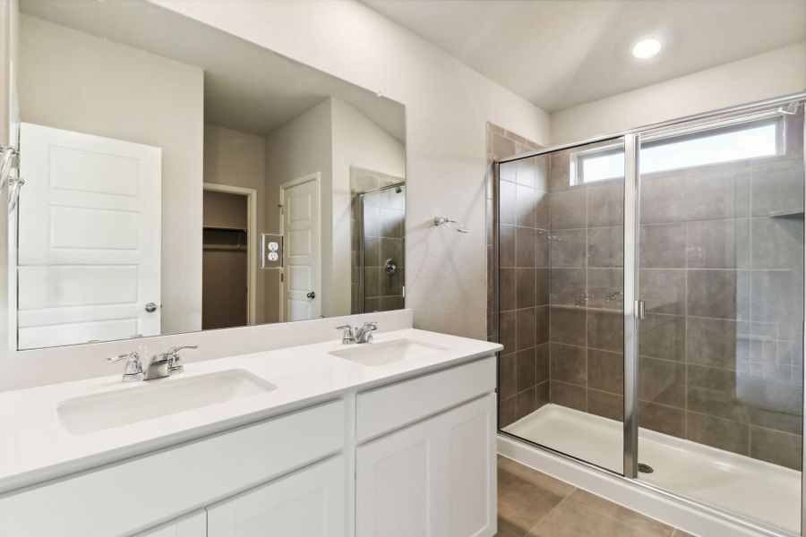 Guest bathroom in the Hughes floorplan at a Meritage Homes community.