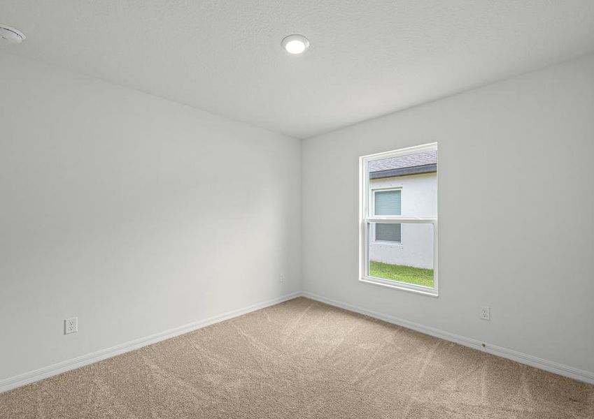 Secondary bedroom with the window open