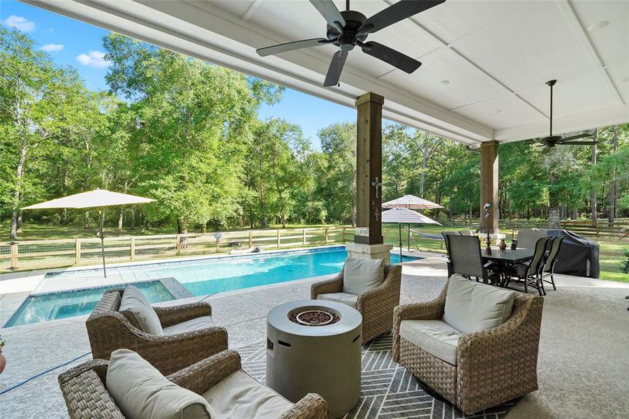 Whether you're hosting lively gatherings or seeking tranquility after a long day, this back yard paradise with a covered patio and a heated pool & spa promises to provide the perfect space where memories are made and stress melts away.