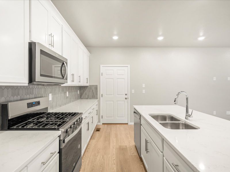 The Vail floorplan interior image taken at a Meritage Homes community in Northern Colorado.