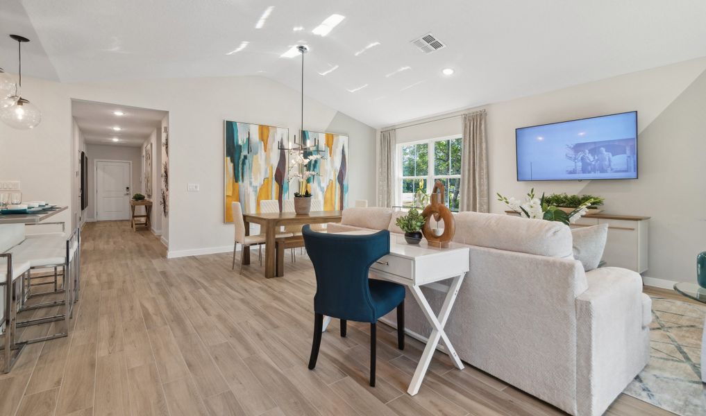 Vaulted ceiling and low-profile lighting in main living areas