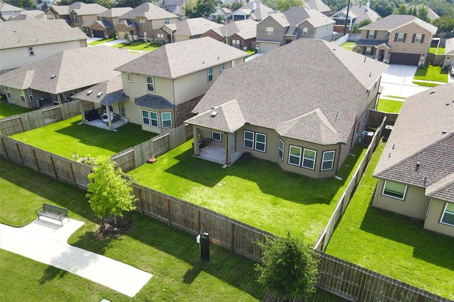 From an alternative aerial perspective of the backyard, a significant benefit emerges: there are no rear neighbors.