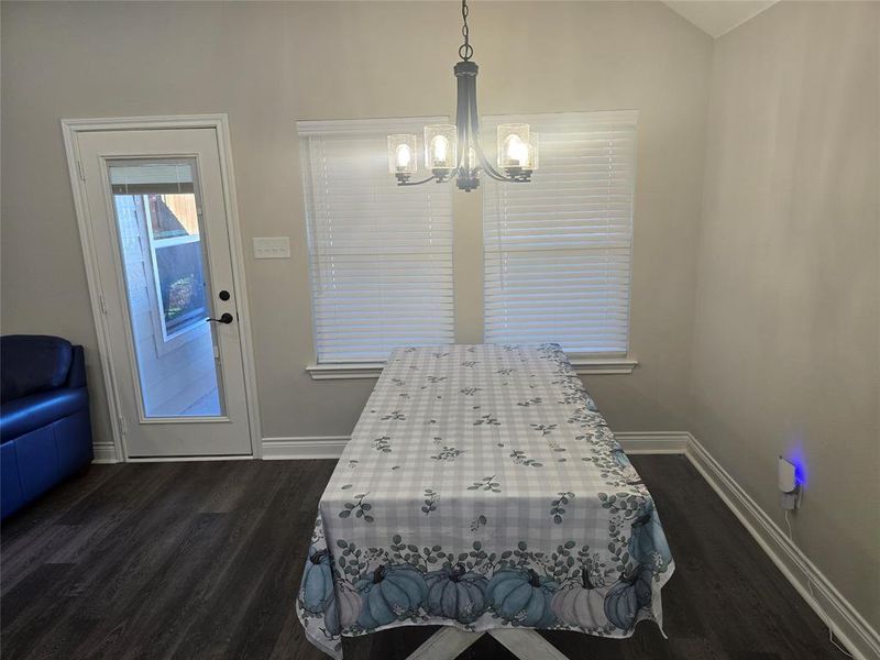 Dining Room featuring dark wood-type flooring