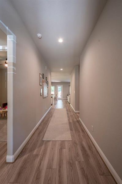 Step in onto beautiful luxury vinyl flooring running throughout the living areas with carpet in the bedrooms and ceramic tile in the baths and laundry room.