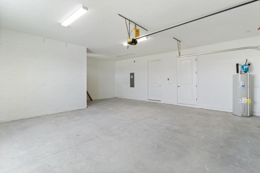 Double car garage with area for workspace or storage