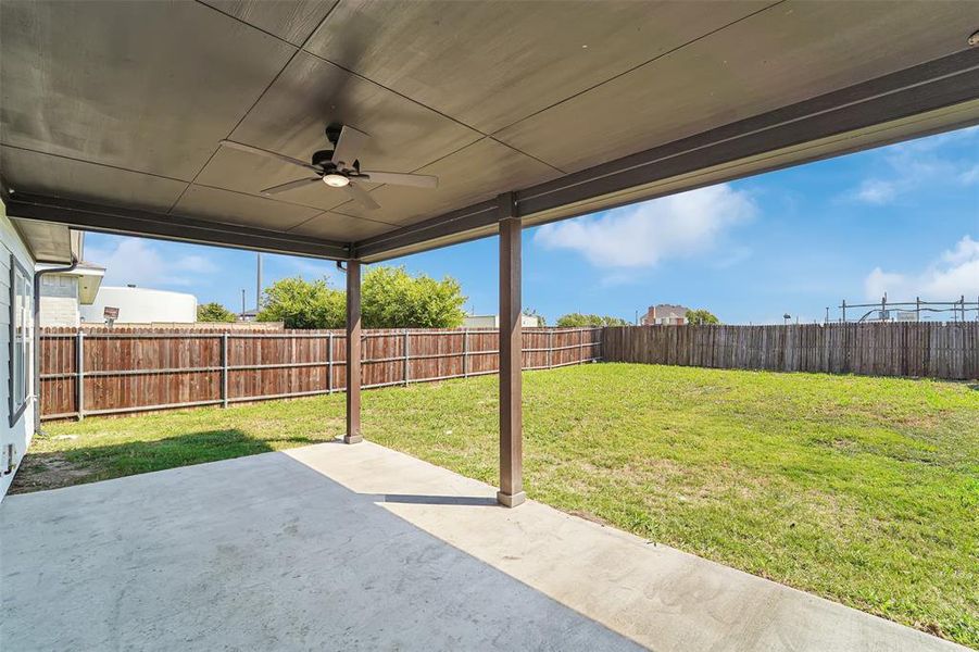 View of patio with ceiling fan