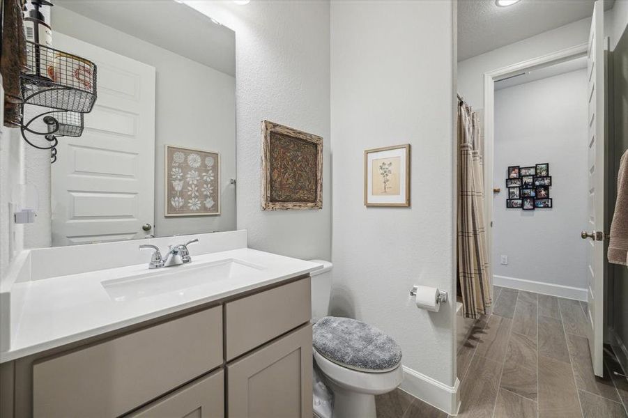 Pass through Secondary Bath that is located between all secondary bedrooms w/ shower/tub combo