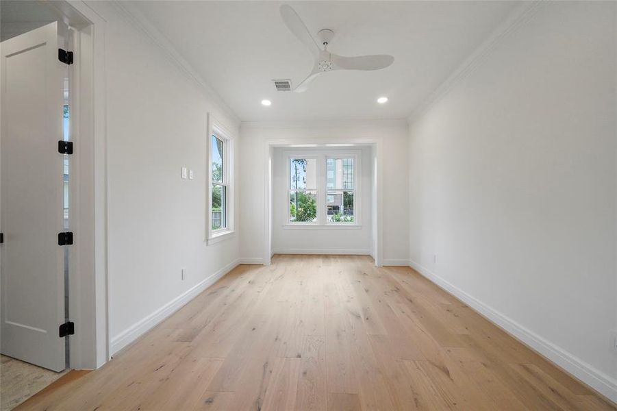 Spacious, bright downstairs in-law suite with natural light, hardwood floors, and ample space for comfort. Includes a full bathroom for guest convenience.