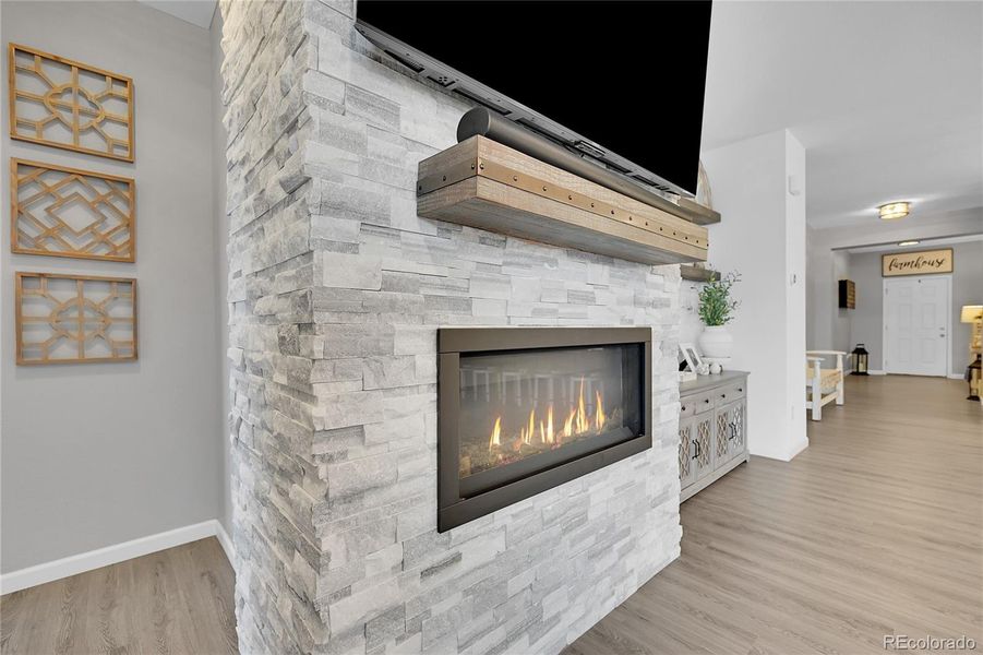 Wall to ceiling stone wall/fireplace