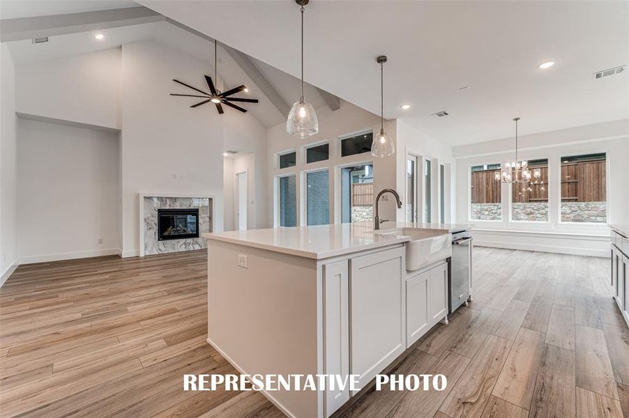 With the perfect open concept design, entertaining is a breeze in our Pembrooke II floor plan.  REPRESENTATIVE PHOTO.