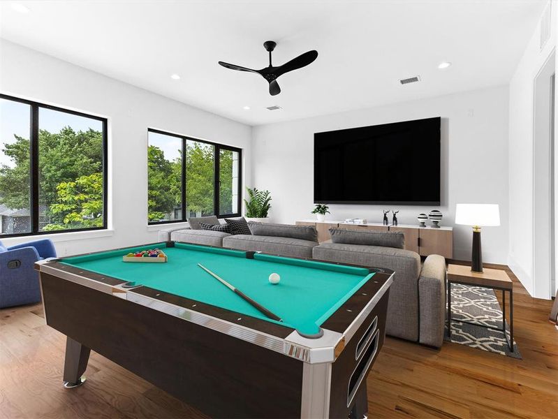 Rec room with billiards, ceiling fan, and wood-type flooring