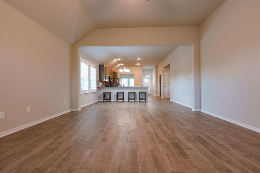 View from family room towards kitchen area. Notice the tile floor.