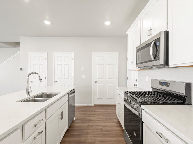 The Woodland floorplan interior image taken at a Meritage Homes community in Aurora, CO.