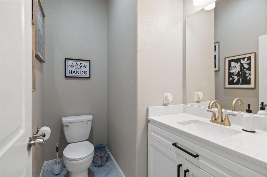 Bathroom with vanity and toilet