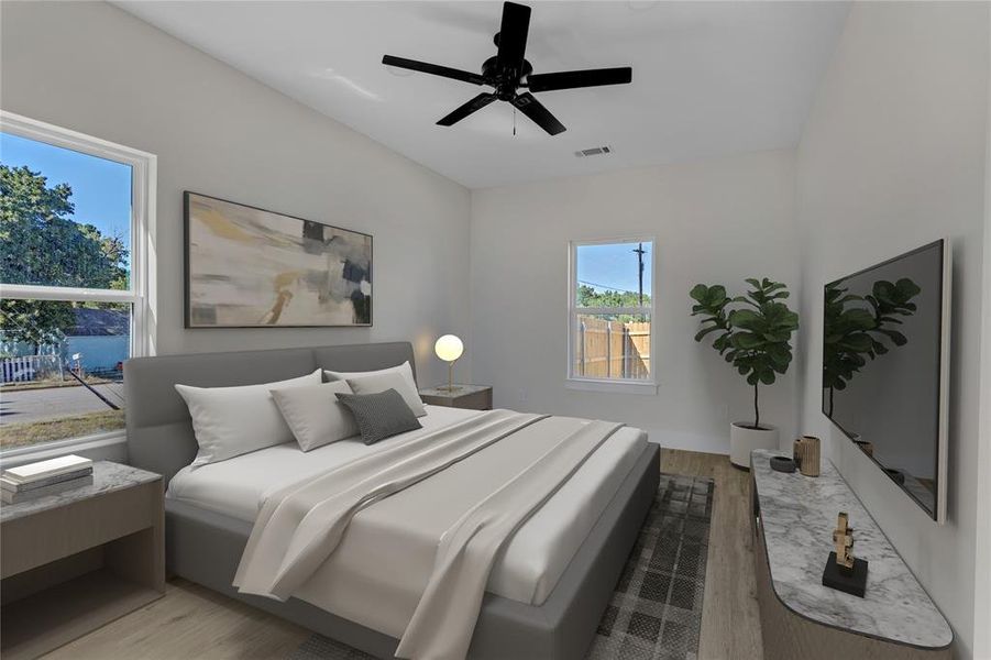 Bedroom with ceiling fan and light hardwood / wood-style flooring