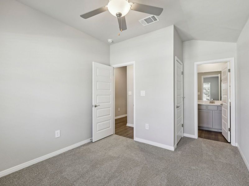 One of the secondary bedrooms has a full bathroom connected.