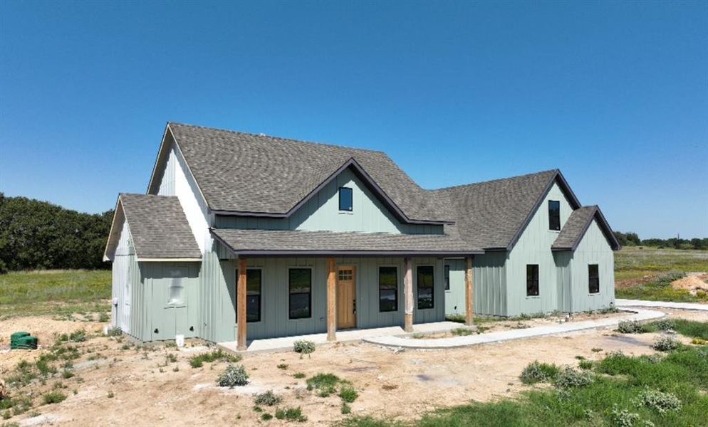 Modern inspired farmhouse featuring a porch