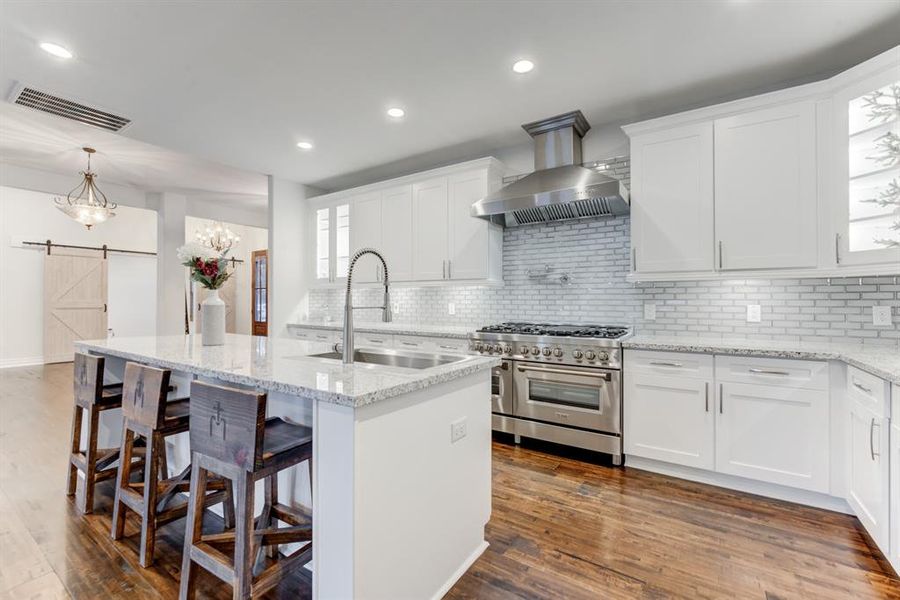 Another view of the space and flow, noticing the abundant cabinetry.