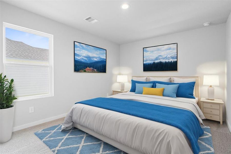 Secondary bedroom features plush carpet, custom paint, lighting, large window with privacy blinds and access to a private bath.