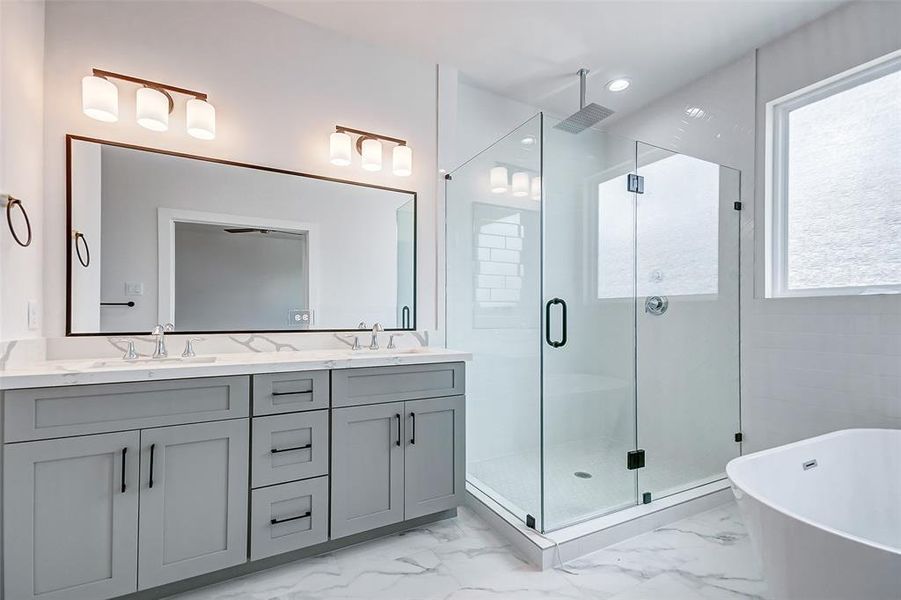 Master Bathroom with handheld and rain shower heads