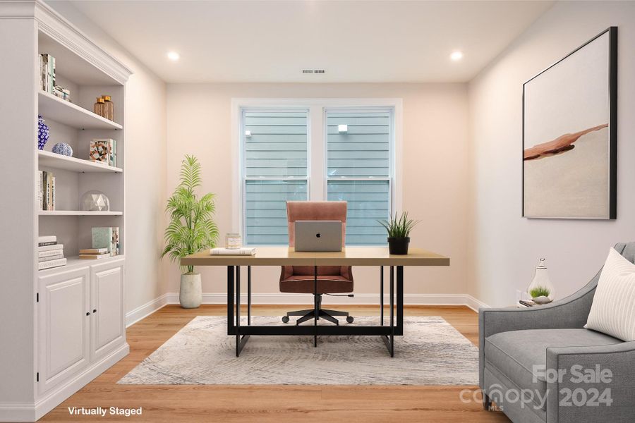 Picture yourself in this generous-sized Flex/Office space with french doors, recessed lighting, neutral paint, and the same gorgeous UPGRADED LVP flooring as the entire main level.