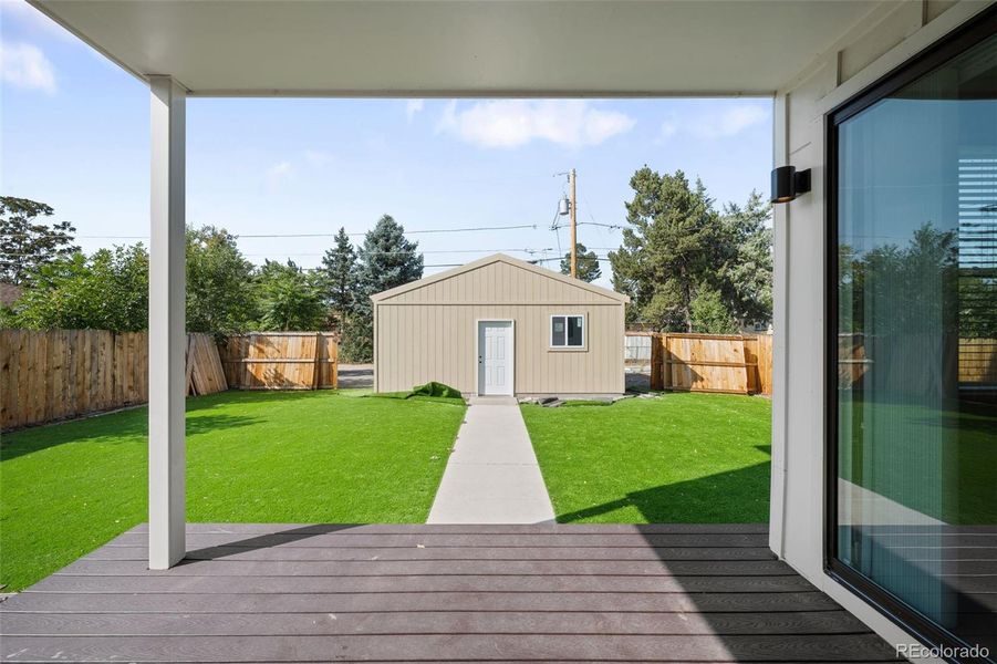 Back covered patio perfect for entertaining or enjoying dinner.