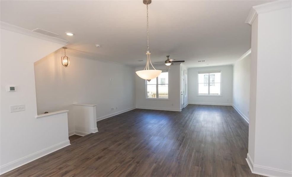 The sunroom provides more light into this gorgeous space. Picture NOT of actual home, but a representation of a previously built TPG property.