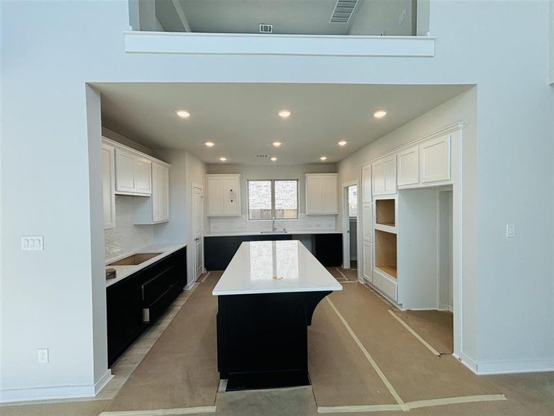 Kitchen w/ built-in appliances