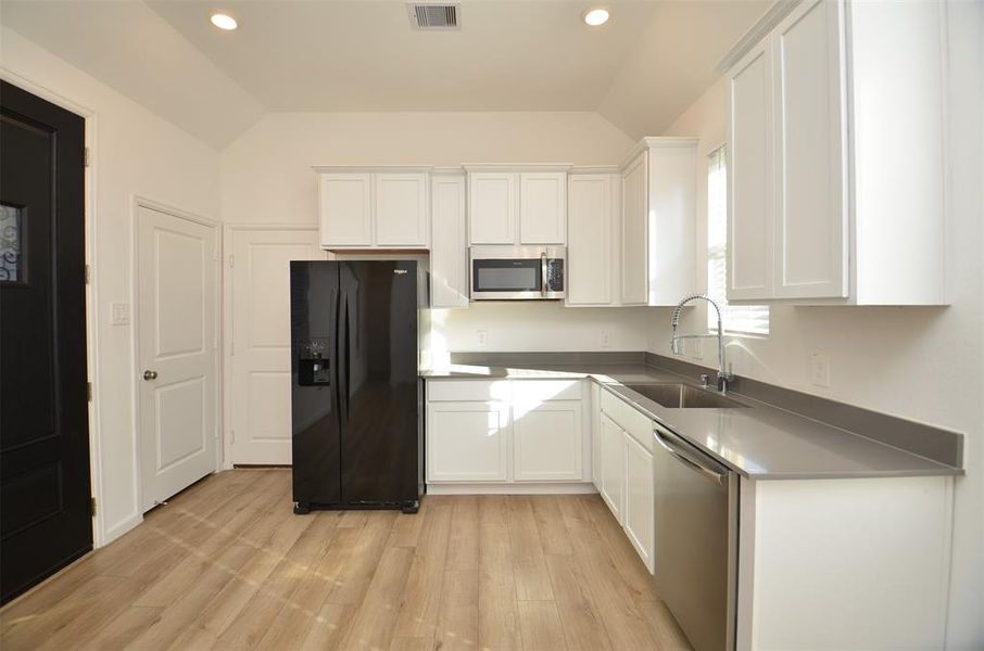 Kitchenette in guest quarters that opens to private entry and private single car garage.