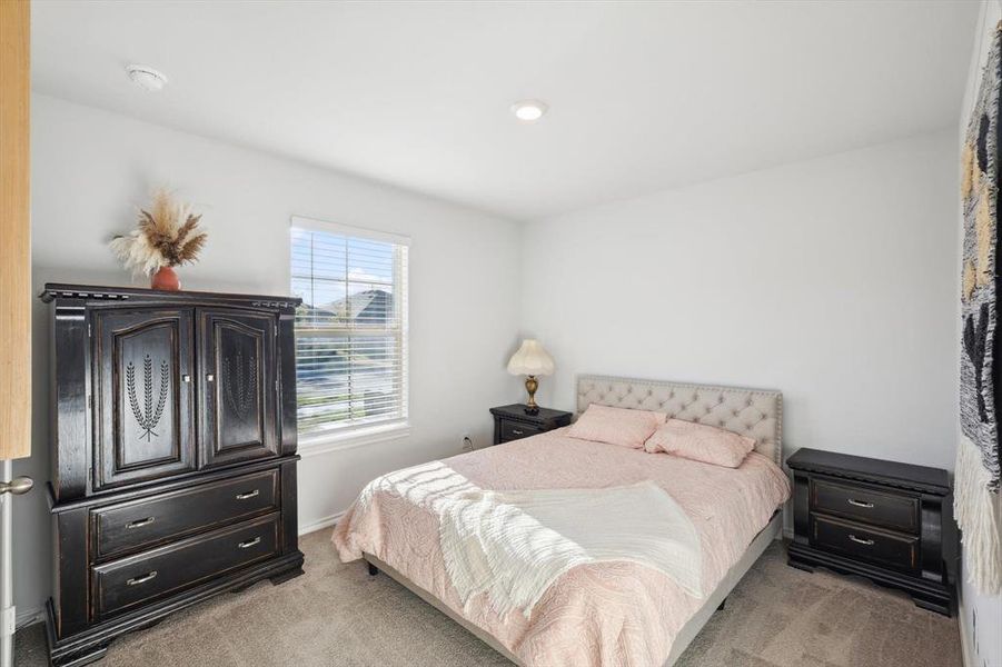 View of carpeted bedroom