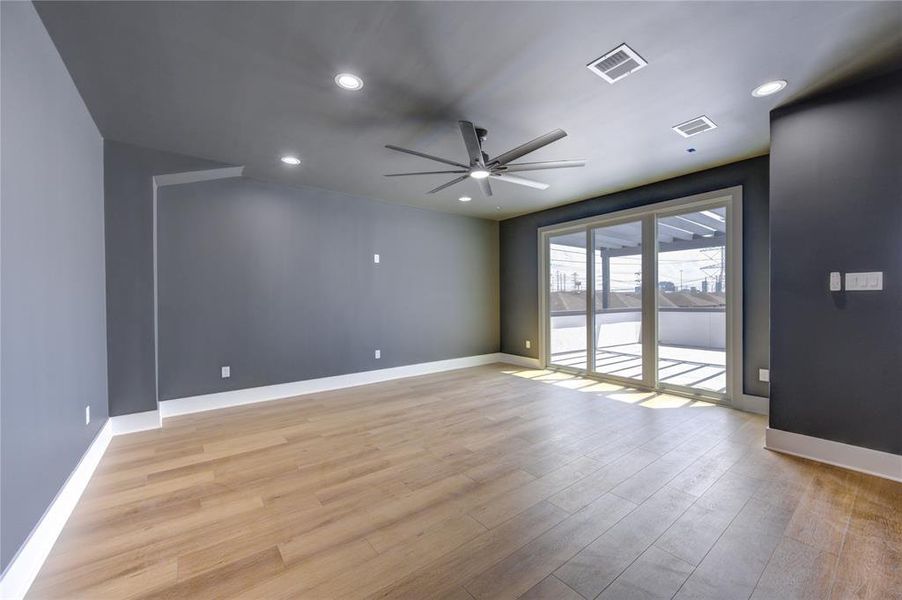 Large sliding glass doors to give you access to the rooftop deck