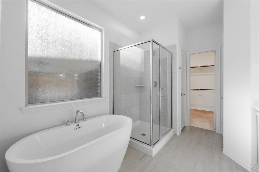 Bathroom featuring plus walk in shower