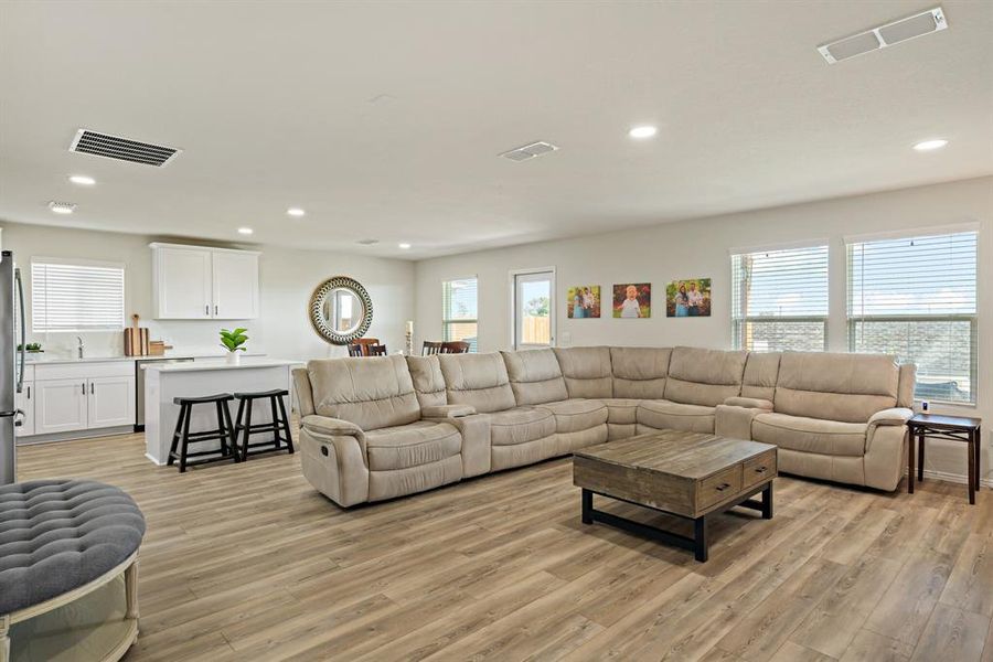 The kitchen’s open design flows into the living area, for un-interrupted entertaining.