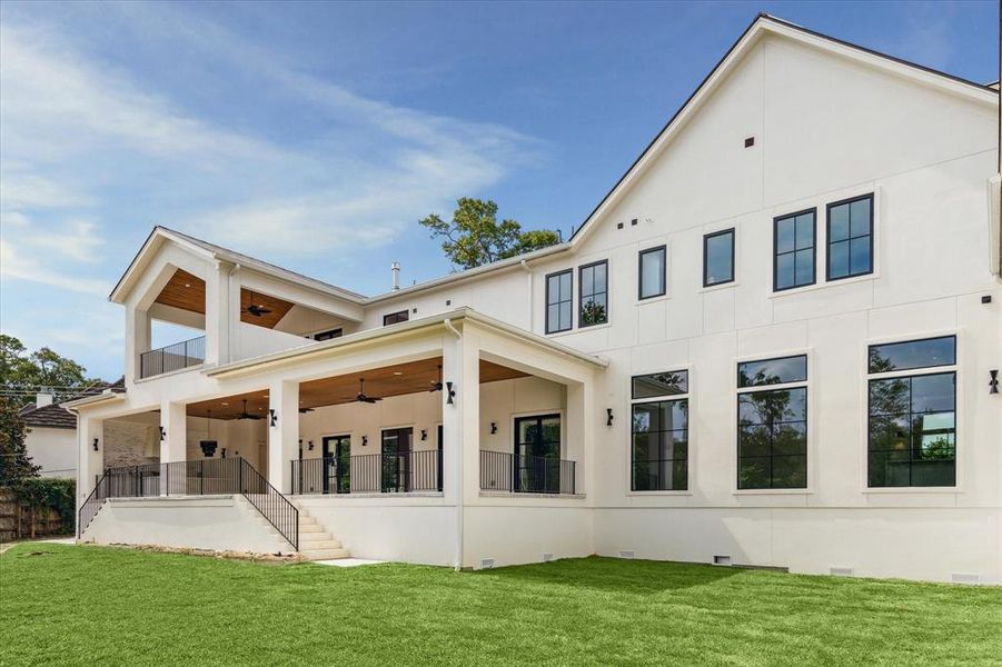 This stunning new construction home by Nest Luxury Homes is situated on an expansive 20,190-square-foot lot in the prestigious River Oaks neighborhood. The vast, verdant lawn offers ample space for a pool or lush gardens, creating endless outdoor possibilities. A spacious loggia provides a perfect covered perch to relax and enjoy the serene surroundings.