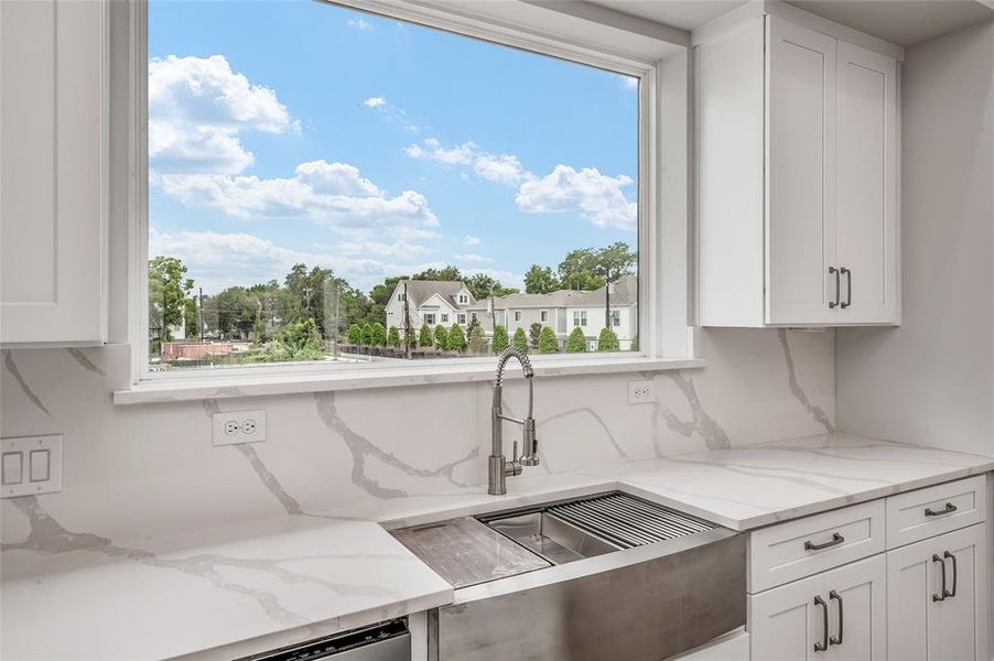 Enjoy the light and beautiful view from your beautiful new kitchen.