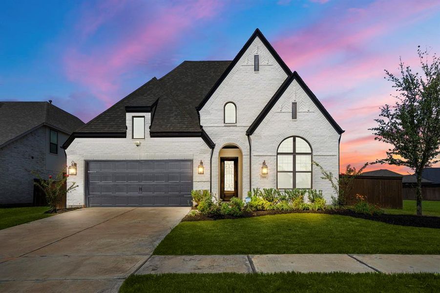 Welcome home! This stunning 2 story home sits on a spacious lot, perfect for a pool with NO direct back neighbors! You're welcomed by an elegant exterior with painted brick and contrasting trim, plus it's been upgraded with dark bronze windows!