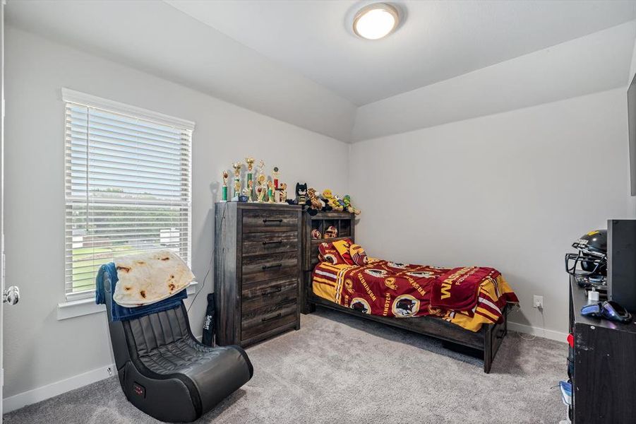 Bedroom featuring carpet