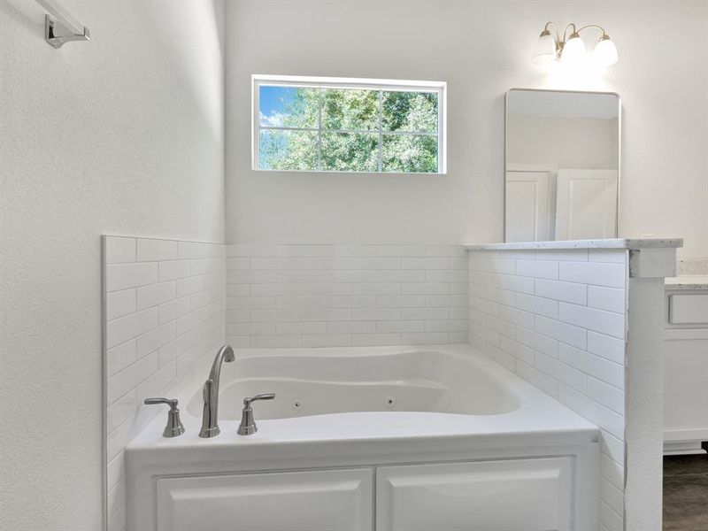 Bathroom featuring a bathing tub