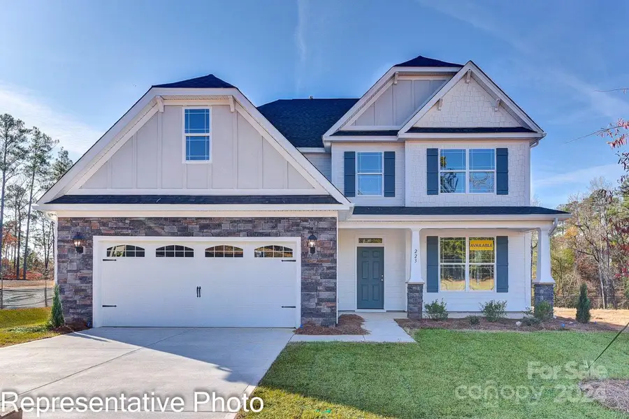 Homesite 06 features a McDowell floor plan with a 2-car front load garage