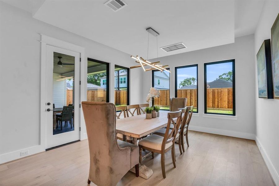 Dining room with a contemporary ceiling