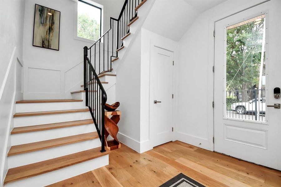 The first floor welcomes you with an elegant entrance, featuring a home office or flex room complete with a full bath. Take the elevator or stairs to explore the rest of this beautiful home.