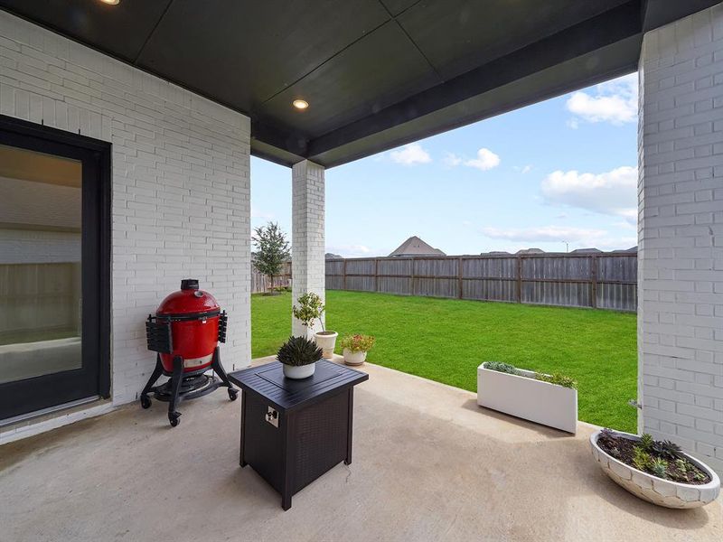 Discover the potential of your outdoor space with this stunning extended covered patio, the ideal starting point for transforming your backyard into a personal oasis.