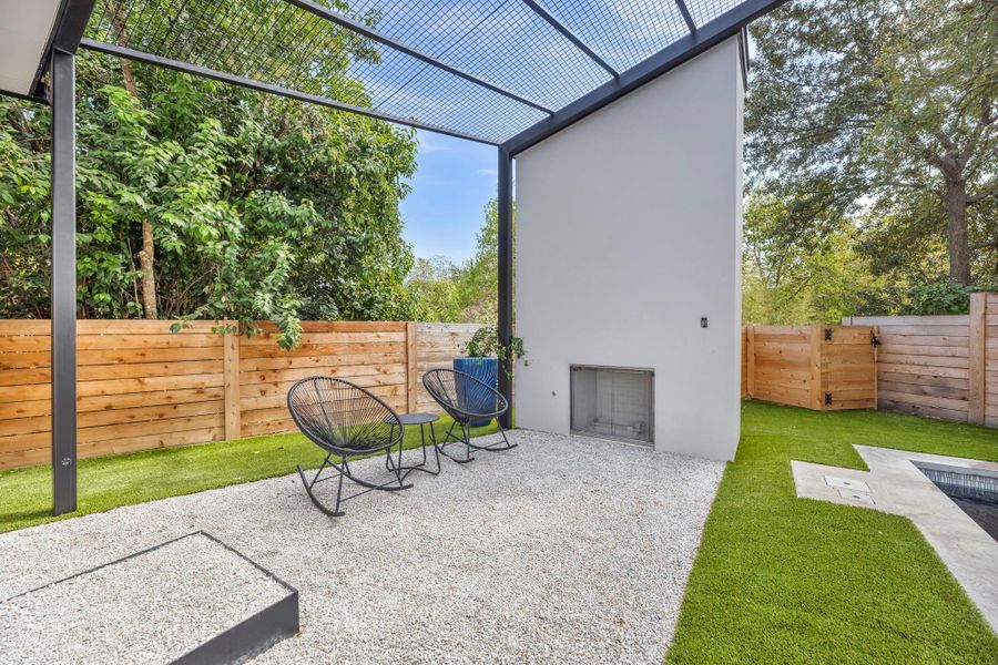 primary bedroom patio with fireplace