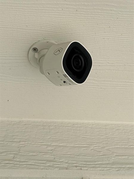 4-5 security cameras around home that can be monitored from your phone.