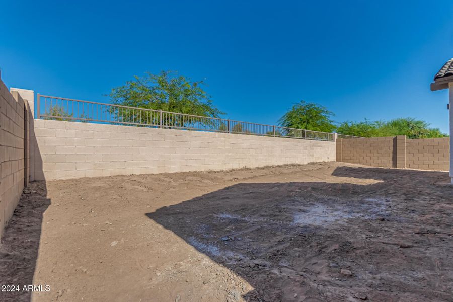 Backyard Backs to Open Space